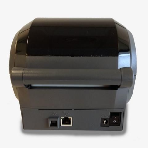 Модель GX42-102420-000 это Zebra GX420t со встроенным ZebraNet 10/100 Print Server