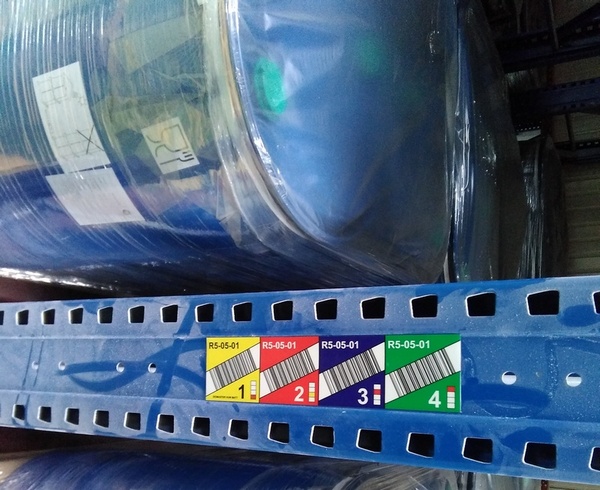 Rack level marking with color zones and barcodes improves storage accuracy and supports efficient warehouse operations.